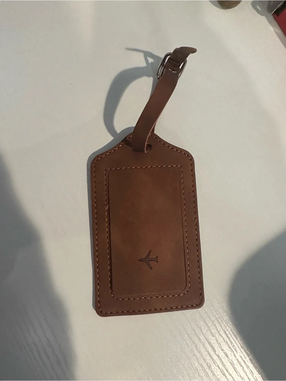 Brown Leather Luggage Tag with Airplane Accent